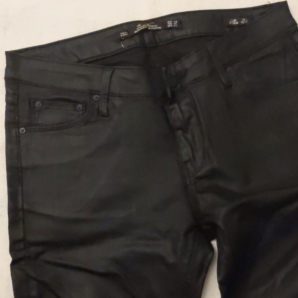 Black wax skinny jeans